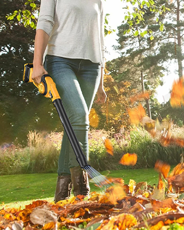 MINI CORDLESS LEAF BLOWER BLOWING LEAVES